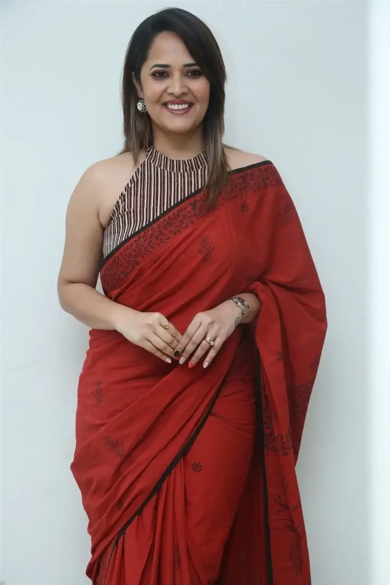 Hyderabad Girl Anasuya Bharadwaj in Red Saree at Movie Press Meet